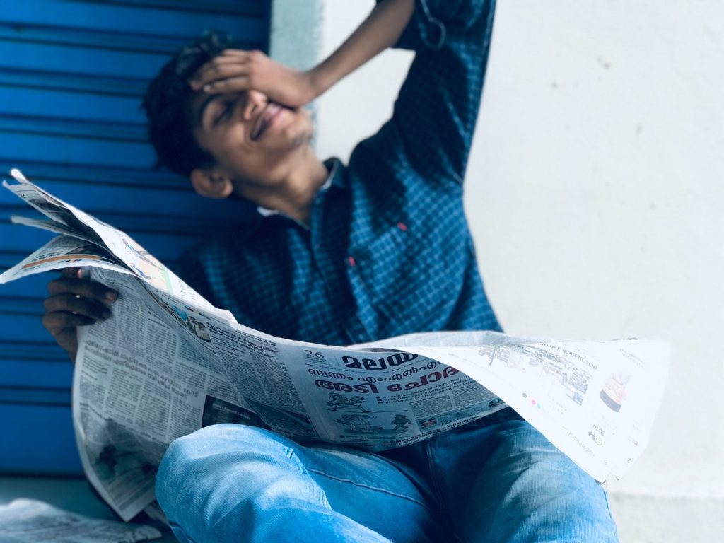 A man reading a newspaper